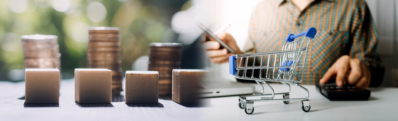 business people working at desk with piggy bank box.business finance saving and investment concept. hand put money coin into piggy bank for saving money wealth.