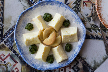 Assorted Georgian cheeses on a plate in a national restaurant Tbilisi
