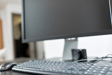 workspace with computer and smartphone