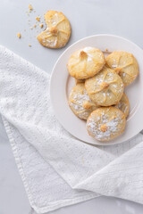 Chocolate filled shortbread cookies in a white kitchen from above