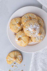 Chocolate filled shortbread cookies in a white kitchen from above