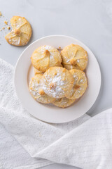 Chocolate filled shortbread cookies in a white kitchen from above