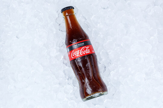 Coca Cola Coca-Cola Coke Zero Sugar in a bottle lemonade soft drink on ice cubes