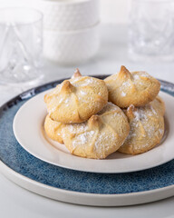 Chocolate filled shortbread cookies in a white kitchen