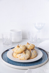 Chocolate filled shortbread cookies in a white kitchen