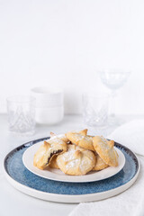 Chocolate filled shortbread cookies in a white kitchen