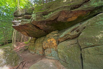 Fototapeta na wymiar Sandstone Overhang Hiding in the Forest