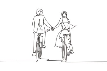 Single continuous line drawing happy romantic married couple ride bicycles back to camera and holding hands. Young man and woman in love wearing wedding dress. One line draw graphic design vector