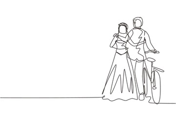 Fototapeta na wymiar Single one line drawing back view of cute romantic married couple with bicycle walking in park on sunny autumn day. Man and woman in love with wedding dress. Continuous line draw design graphic vector