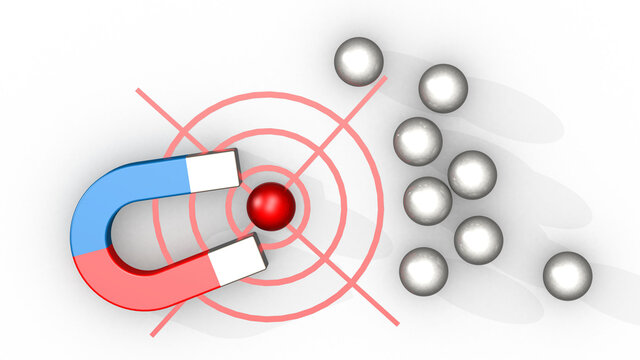 Magnet attracts red sphere from white