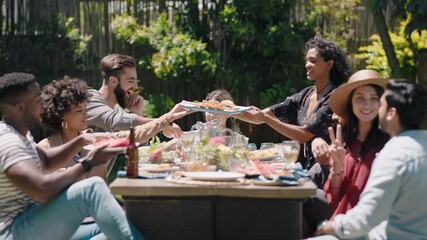 happy summer young people celebrating garden party lunch having fun chatting sharing healthy food enjoying weekend reunion relaxing on beautiful summer day outdoors 4k