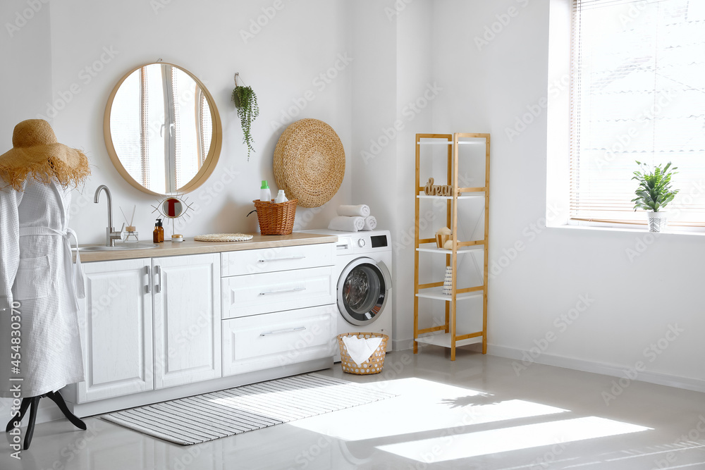 Wall mural Interior of bathroom with modern washing machine