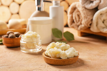 Bowl of shea butter on table