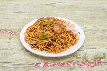 Popular and classic Chinese Sichuan home-cooked dish-fried noodles with hot-cooked pork with green pepper