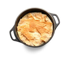 Cooking pot with tasty Shah Pilaf on white background