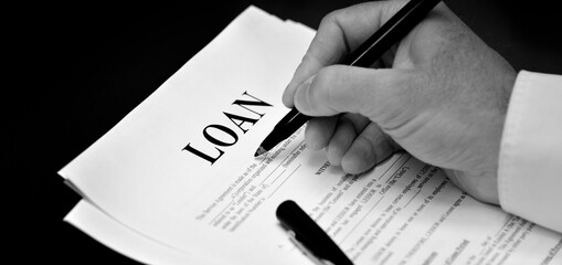 Loan Document Agreement on Desk with Pen