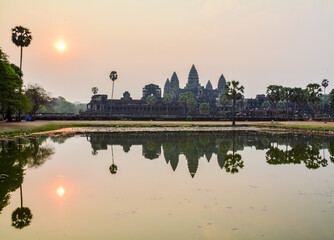 Fototapeta na wymiar Sunrise reflections of Angkor Wat, Cambodia