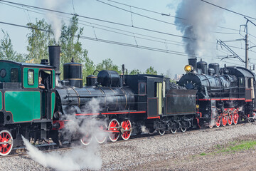 Plakat Steam retro train departs from the station.