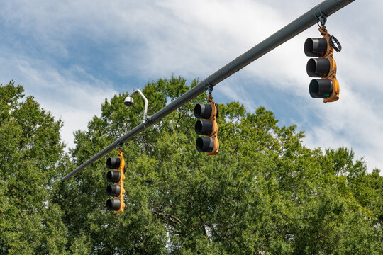 Overstreet stoplighttraffic signals at an intersection on a summer day