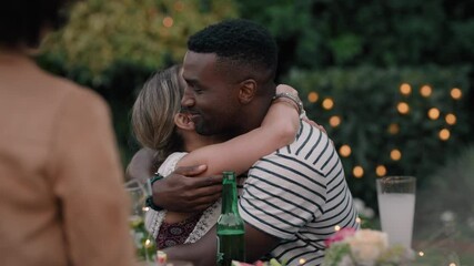 best friends hugging celebrating garden party enjoying friendship reunion gathering sitting at table having fun sharing weekend together relaxing 4k