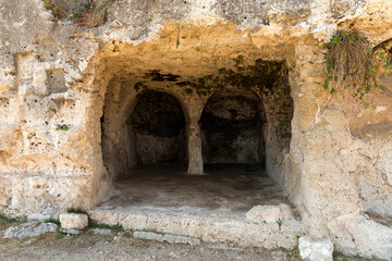 Sceneries of The Street of Tombs ( Via dei Sepolcri) in The Neapolis Archaeological Park in Syracuse, Sicily, Italy.