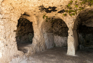 Sceneries of The Street of Tombs ( Via dei Sepolcri) in The Neapolis Archaeological Park in Syracuse, Sicily, Italy.