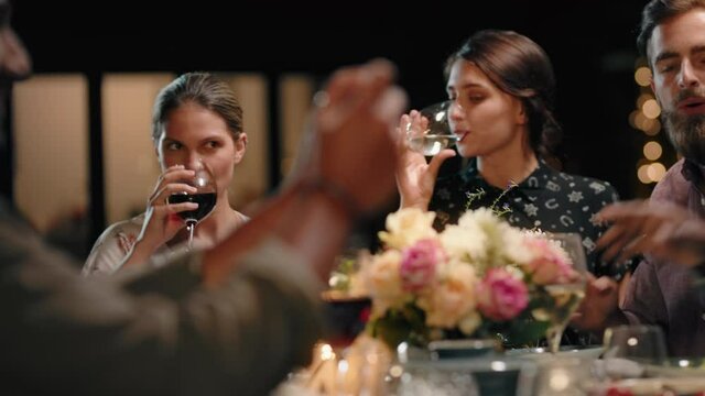 beautiful young women friends enjoying dinner party celebrating friendship with friend taking photos using smartphone sharing relaxing evening reunion gathering on social media 4k