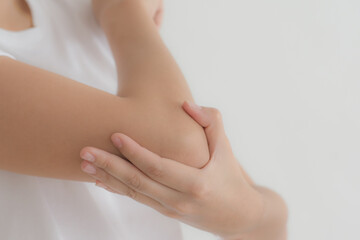 female with arm pain