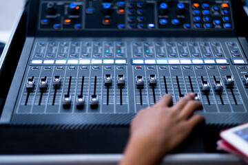 sound check for concert, mixer control, music engineer, backstage 
