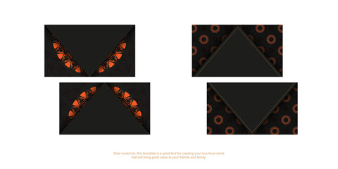 Business card design in black with orange patterns. Stylish business cards with a place for your text and vintage ornaments.
