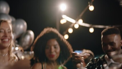 group of stylish friends celebrating at glamorous rooftop party event making toast drinking champagne at formal social gathering enjoying evening celebration at night 4k