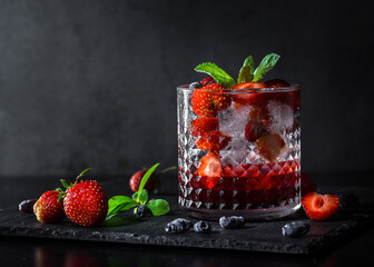 Strawberry lemonade with honeysuckle and ice.