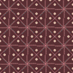 ethnic pattern with geometric seamless flower in red background for fabric