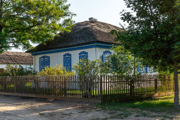 Typical middle class Cossack house. Whitewashed adobe walls, shuttered windows and a reed roof