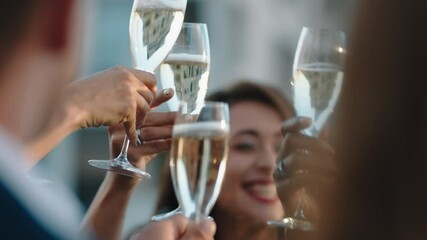 happy group of friends celebrating making toast to glamorous party event drinking champagne wearing stylish fashion at formal social gathering enjoying rooftop dance celebration at sunset 4k