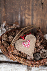 Rustic Christmas Still Life With Basket And Pine Cones