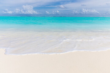 Fototapeta na wymiar Tropical sand beach and blue sky with white clouds in the Maldives
