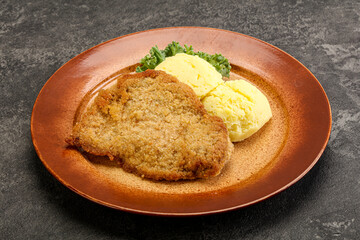 Crispy chicken schnitzel with mashed potato