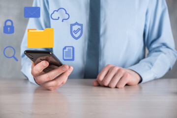 Document Management System DMS .Businessman hold folder and document icon.Software for archiving, searching and managing corporate files and information.Internet Technology Concept.Digital security