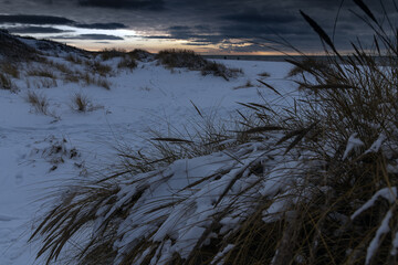 Obraz na płótnie Canvas Winter evening by Baltic sea in covid time.