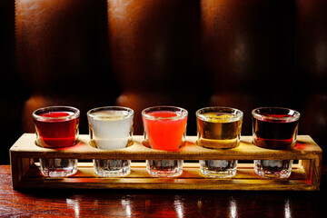 different shots on the wooden background