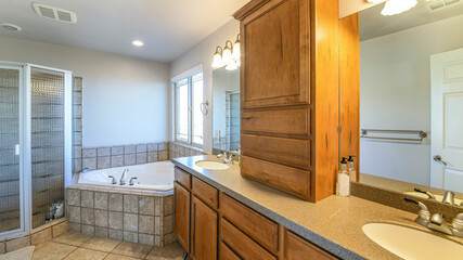 Pano Bathroom interior with tiles and double vanity sink