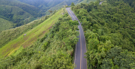 sky road over top of mountains with green jungle in Nan province, Thailand