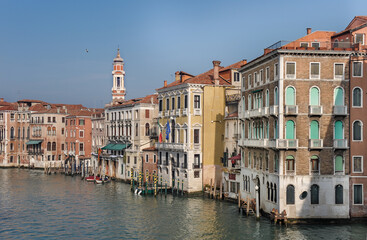 Fototapeta na wymiar Old buildings facades along Grand Canal in Venice, Italy.
