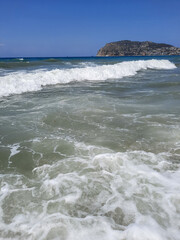 Fototapeta na wymiar waves on the beach TURKEY MEDITERRANEAN SEA