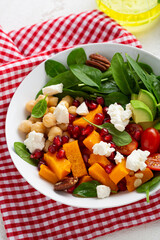 Close up of avocado and pumpkin salad with chickpea
