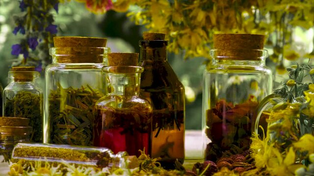 Bottled herbal tincture, homeopathy. Selective focus.