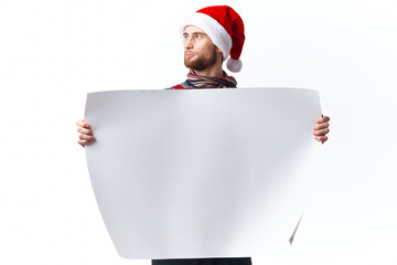 emotional man in New Year's clothes holding a banner holiday copy-space studio