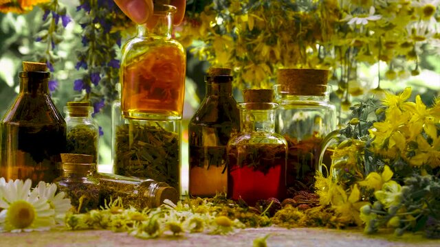 Bottled herbal tincture, homeopathy. Selective focus.
