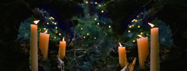 magic burning candles in fabulous Night forest natural Background. mysterious fairy scene....